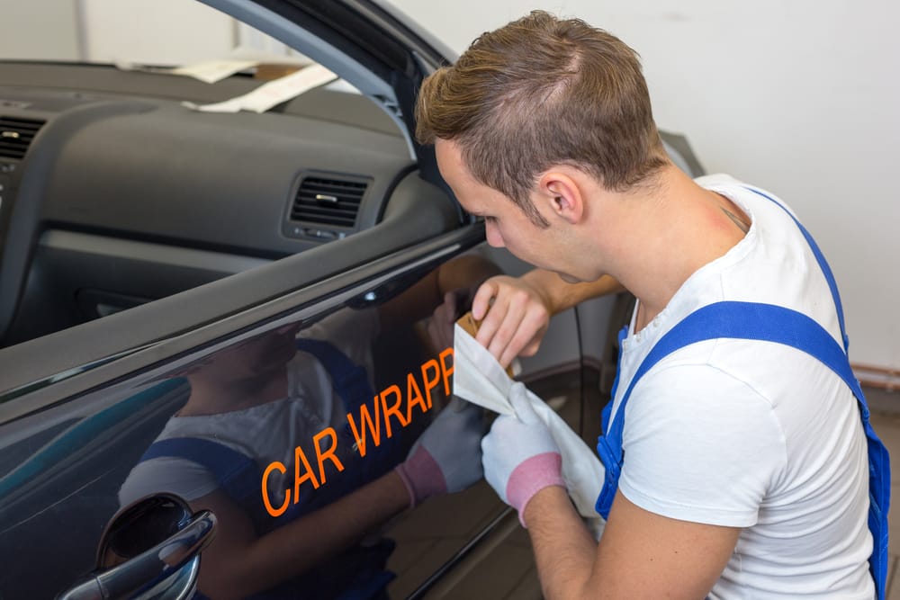 Vehicle lettering installation by a professional